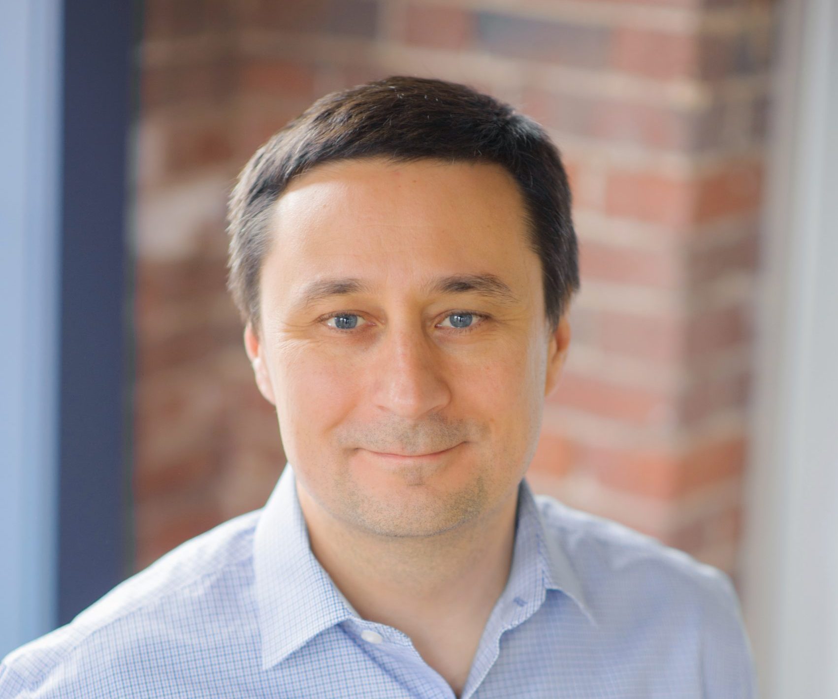 Headshot of Chief Technology Officer Slava Akmaev